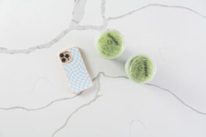 Image of 2 matcha lattes that say "homeowner"